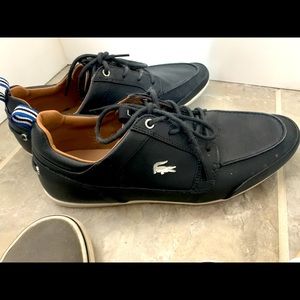 Side 9 Lacoste men’s shoes.